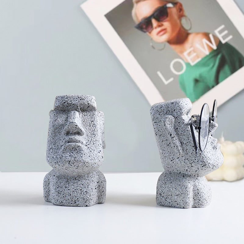 stone face eyeglass holder stand