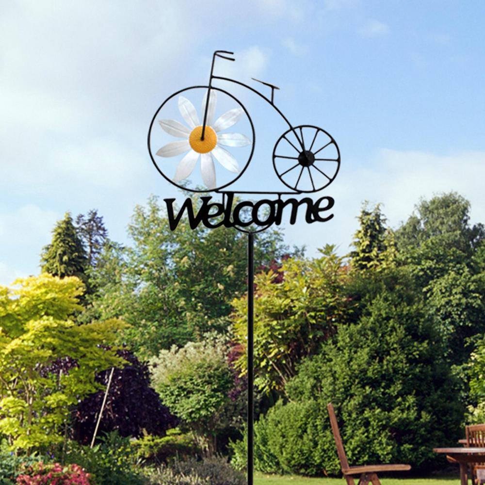 charming bicycle welcome windmill