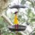 Artistic Raincoat Girl Bird Feeder